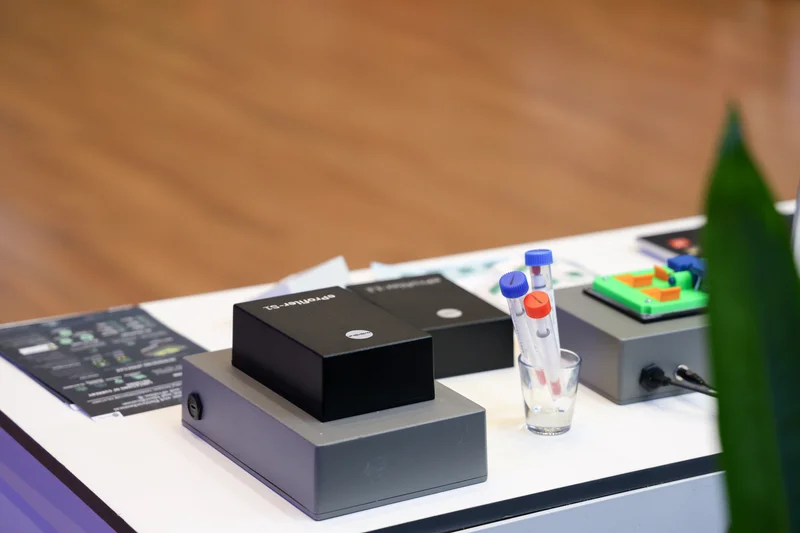 eProfiler devices on display at UMRIIS showcase with test tubes